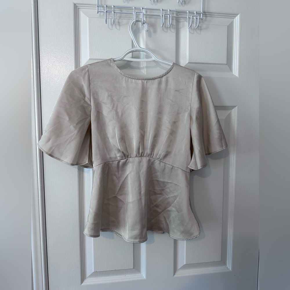 Flutter sleeves peplum top